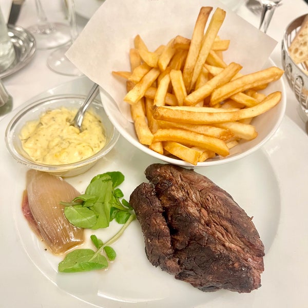 Non-touristy local French restaurant in Paris where you can order scargots , Foie gras, Steak and Fries, Cheese etc. English menu and English speaking staffs are available.