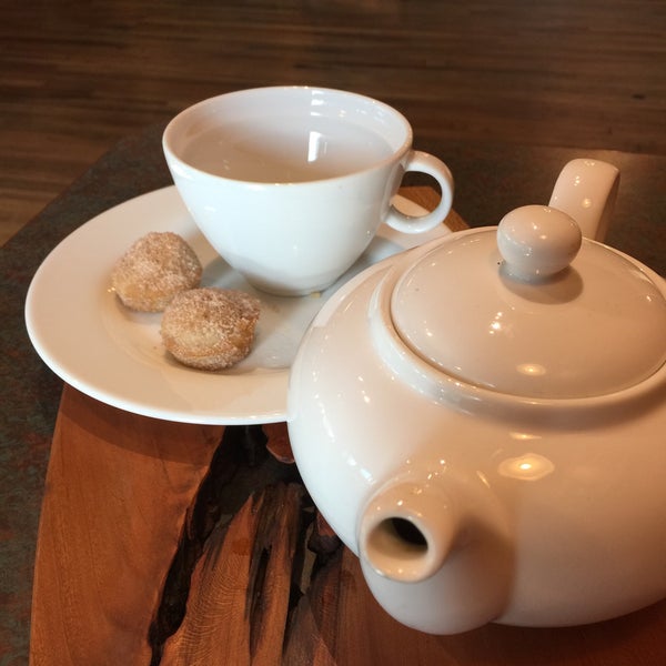 Pot of tea, bites of donuts, TONS of seating options. Wish there was someplace like this in my hometown! :-<