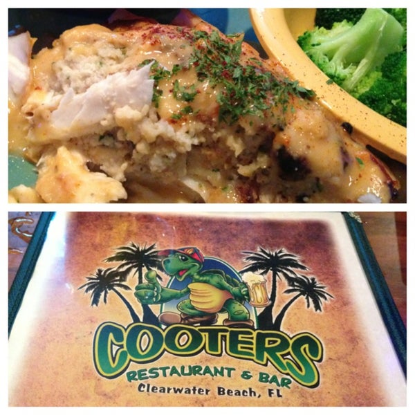 Photo taken at Cooters Restaurant &amp; Bar by Travis T. on 2/26/2013