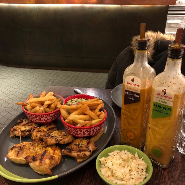 Photo taken at Nando&#39;s by Gyongyver S. on 1/11/2020