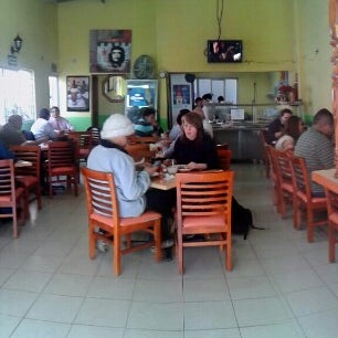 Photo taken at Son Cubano Café Gourmet &amp; Restaurante by Ricardo on 1/3/2014