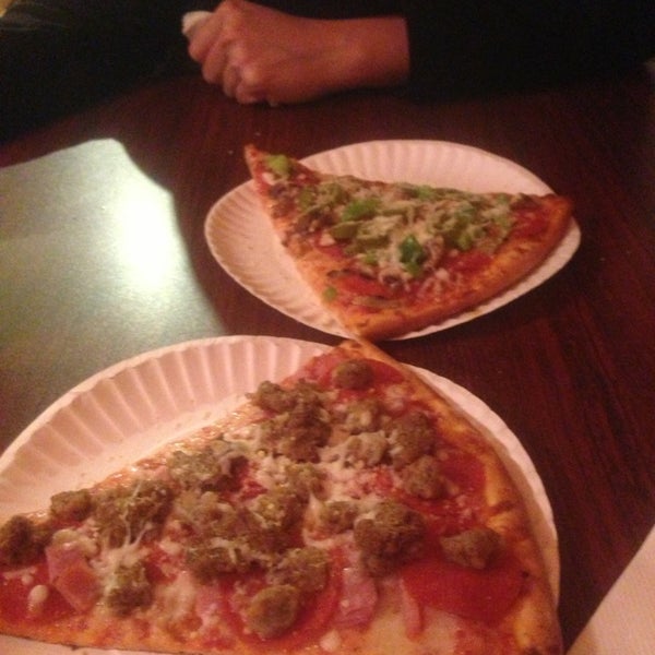 Photo taken at Uncle Joe&#39;s Pizza by Krystal P. on 12/31/2012