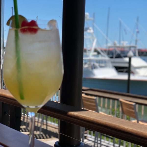 Photo taken at Outriggers Tiki Bar and Grille by Kernst C. on 4/21/2019