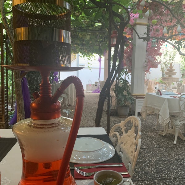 Foto diambil di Secret Garden Cafe &amp; Restaurant oleh Şerif Y. pada 10/18/2019