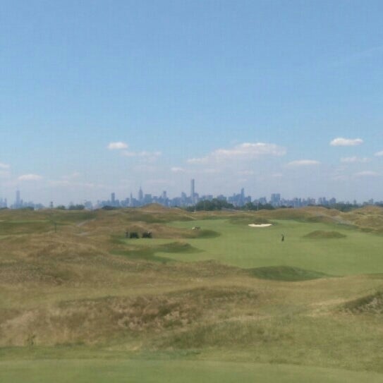 Photo taken at Trump Golf Links at Ferry Point by Jeff M. on 8/7/2015