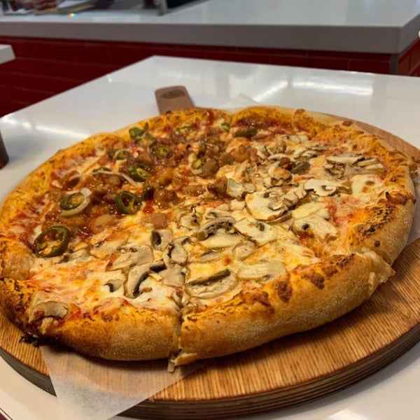 Photo taken at Corneli Pizza by Adrian L. on 8/10/2020