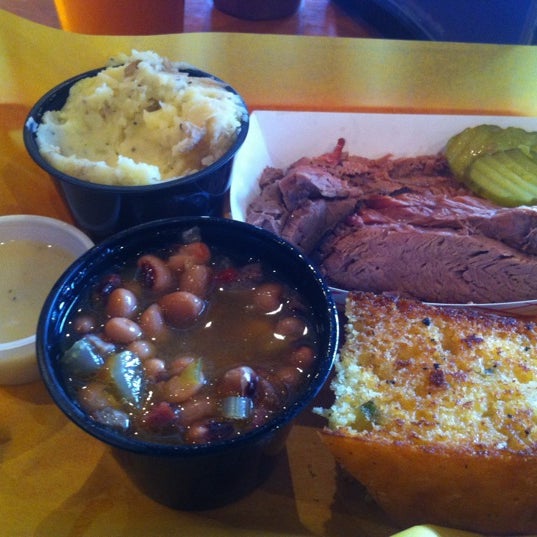 Photo taken at Moe&#39;s Original BBQ by Christie H. on 11/26/2012