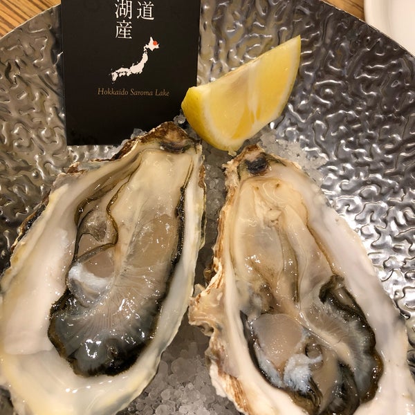 Photo taken at Oyster Table by とーきー C. on 3/18/2018