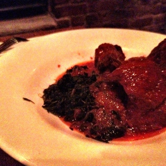 Photo taken at Buka Nigerian Restaurant by Nicholas D. on 10/12/2012