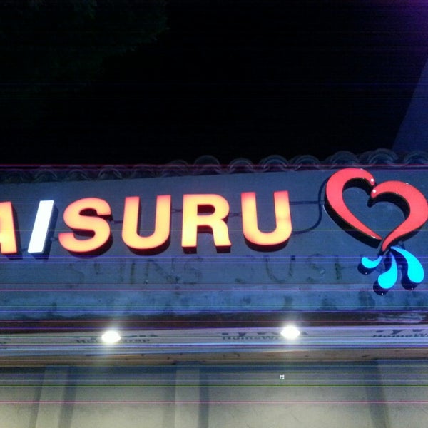Photo taken at Aisuru Sushi + Sake Bar by Brett H. on 11/17/2013
