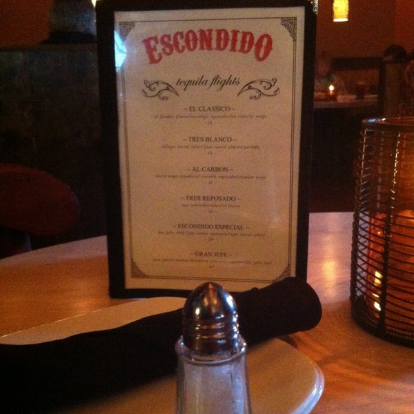 Foto diambil di Escondido Mexican Cuisine &amp; Tequila Bar oleh Jonathan P. pada 4/10/2013