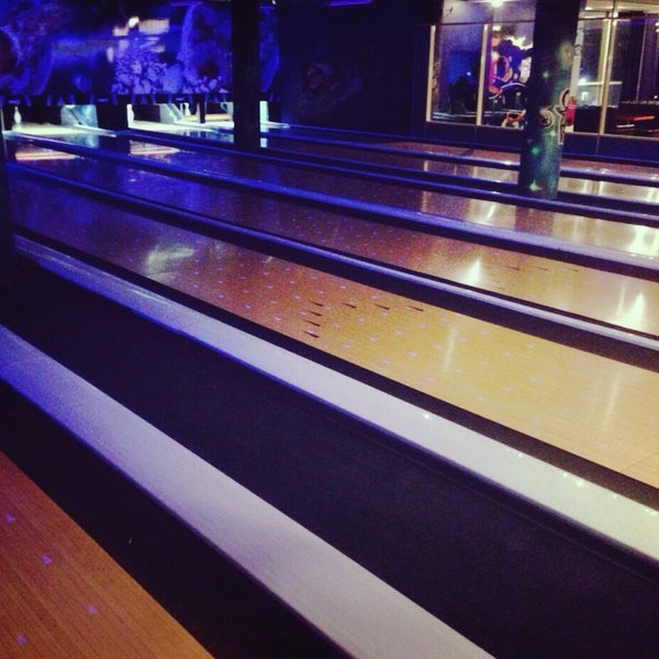 Photo taken at КосмоДоМ bowling &amp; bar by Dasha on 1/3/2015