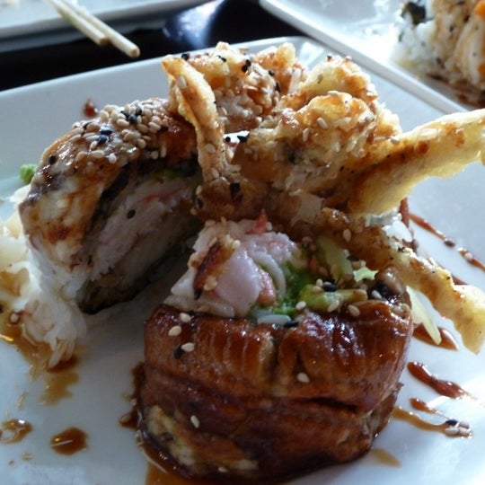 Photo taken at Sushi Mon Japanese Cuisine by Brian H. on 4/1/2012