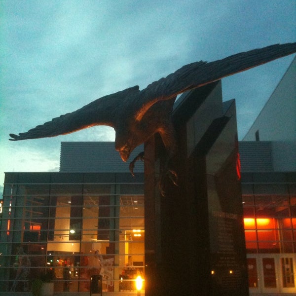 The Falcon Spirit statue at dusk.