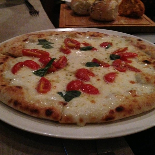 Photo taken at Favola Italian Restaurant 法沃莱意大利餐厅 by Brian M. on 8/4/2013
