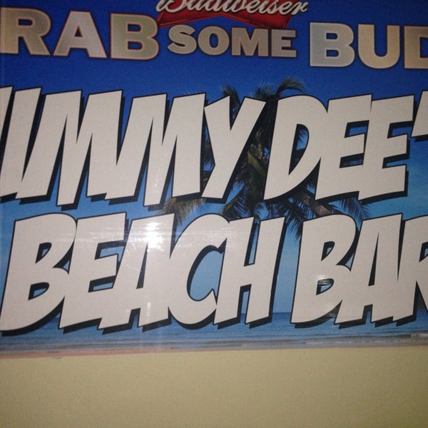 Photo taken at Jimmy Dee&#39;s Beach Bar by Zane F. on 12/30/2013