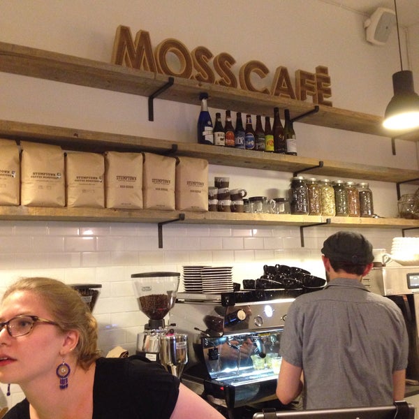 Photo taken at Moss Café: Farm-To-Table Restaurant and Coffee Shop by Eric S. on 5/29/2015
