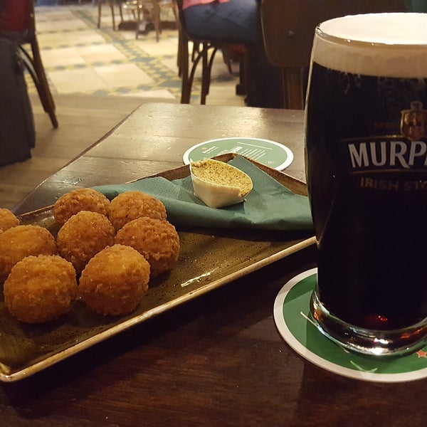 It's hard to find, if you're on the floor above it (you'll have to go back and through passport control), but worth it for their Dutch bitterballs with Irish stout!