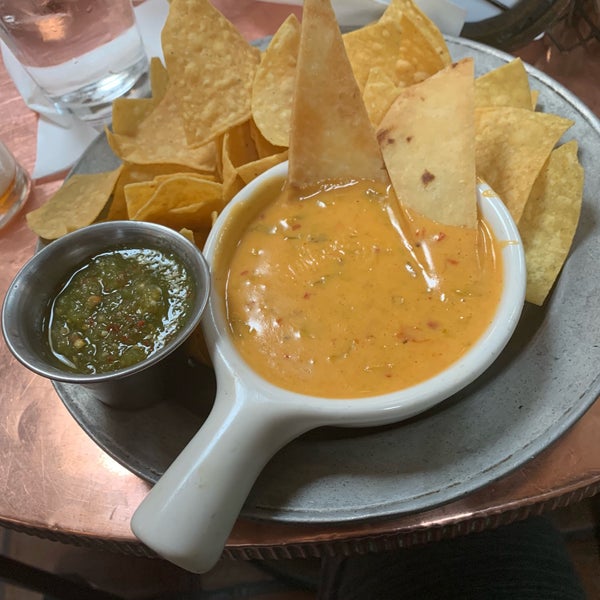 Spotty service with club music but super cheap and the queso chips and poblano were second to none. Cool interior too. Bar was great