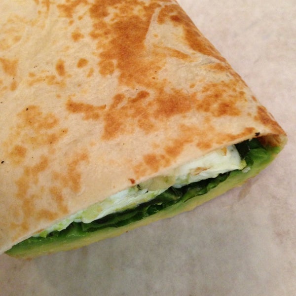 Made to order breakfast sandwiches! Grilled flour tortilla, egg whites, avocado, basil, tomato and cheese