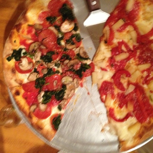 Photo taken at Strong&#39;s Brick Oven Pizzeria by Jason C. on 11/11/2012