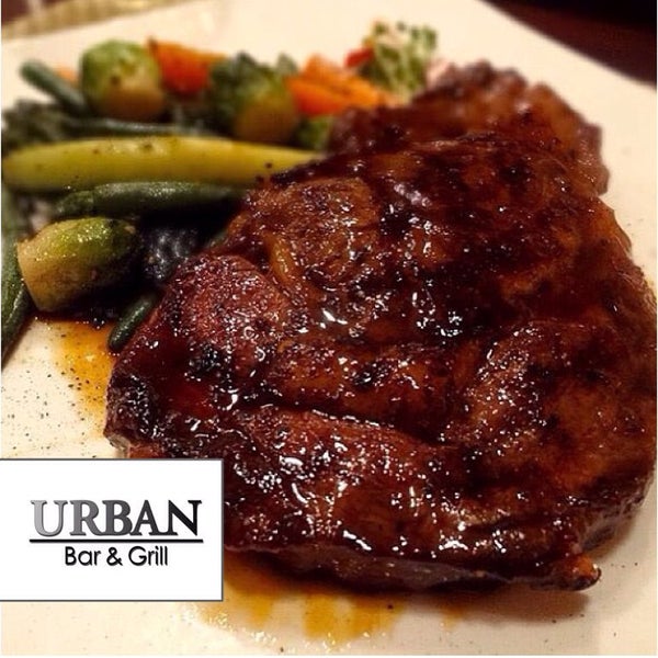 Photo taken at Urban Bar &amp; Grill by Marketing O. on 7/3/2015