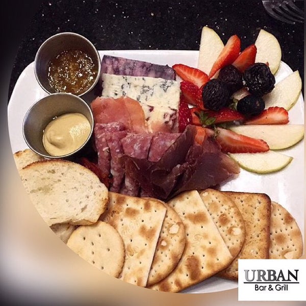 Photo taken at Urban Bar &amp; Grill by Marketing O. on 7/27/2015