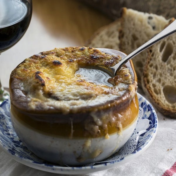 Get the French Onion Soup. It's one of our absolute favorites on a crisp, cold-weather night — a traditional onion soup au gratin with melty, bubbly swiss cheese.