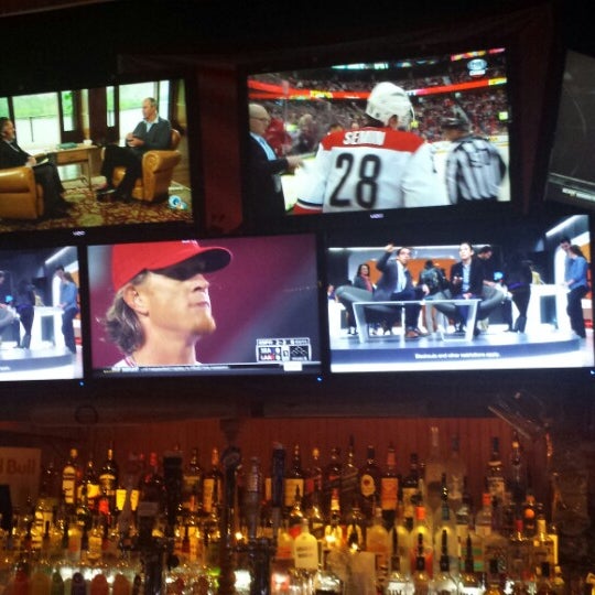 Photo taken at Twisted Moose Sports Bar by Dave W. on 4/1/2014