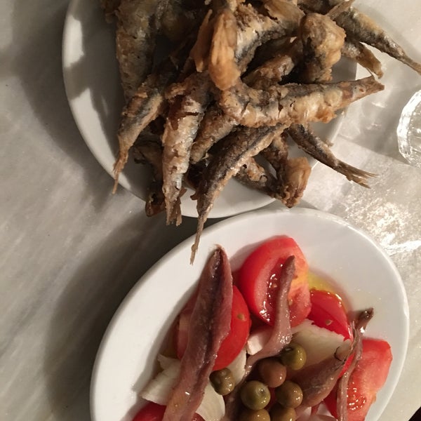Fried fish and anchovies with tomatoes and onions. Although very simple and traditional.. these dishes are worth the visit. Promise.