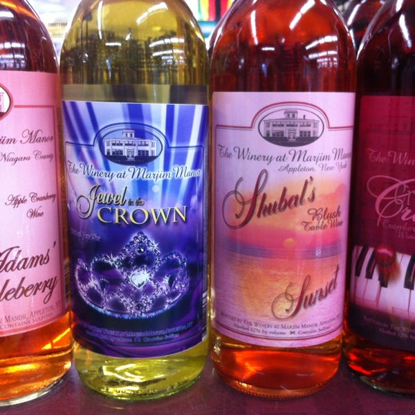 Photo taken at Northside Wine &amp; Spirits by Janet W. on 8/2/2013