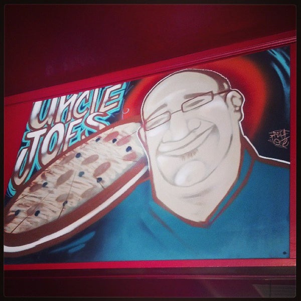 Photo taken at Uncle Joe&#39;s Pizza by Andy W. on 6/20/2013