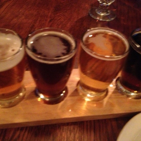 Photo taken at Victoire: A Belgian Beer Bar &amp; Bistro by Robert C. on 2/14/2013