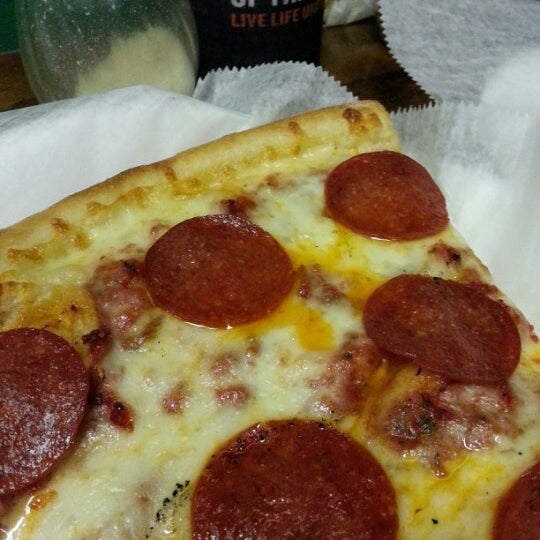 Photo taken at Joey Brooklyn&#39;s Famous Pizza by Stephanie F. on 12/23/2012