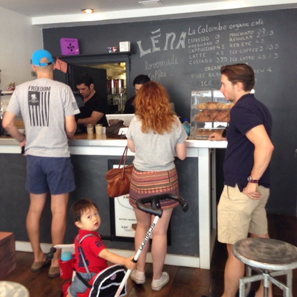 Photo taken at LENA CAFE by Momar V. on 6/21/2014