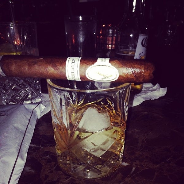 Photo taken at Merchants Cigar Bar by Nikolaos on 4/19/2014