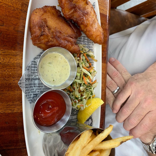 Photo taken at The Sandbar Seafood Restaurant by elaine on 8/5/2019