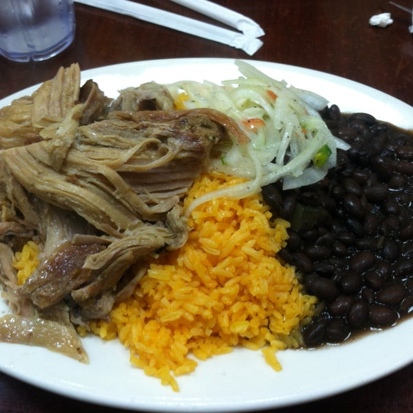 Photo taken at Sophie&#39;s Cuban Cuisine by Gil L. on 4/16/2013