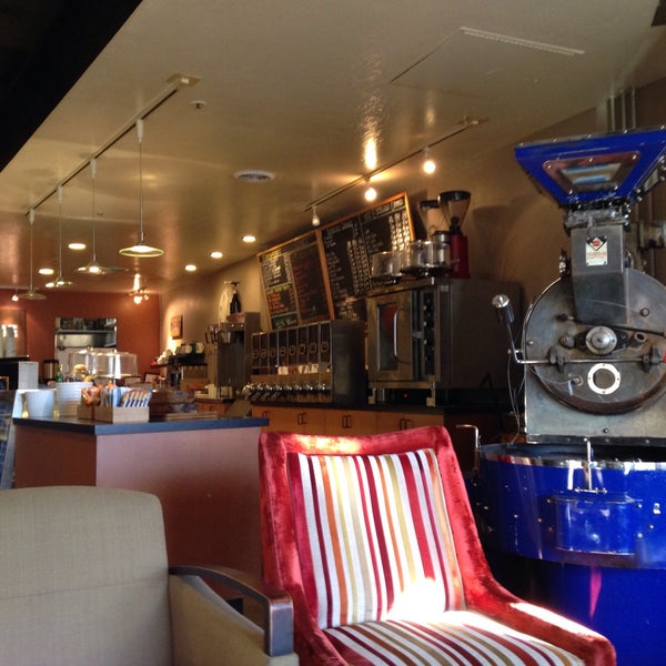 Photo taken at Village Coffee Roastery by Chris T. on 11/1/2015
