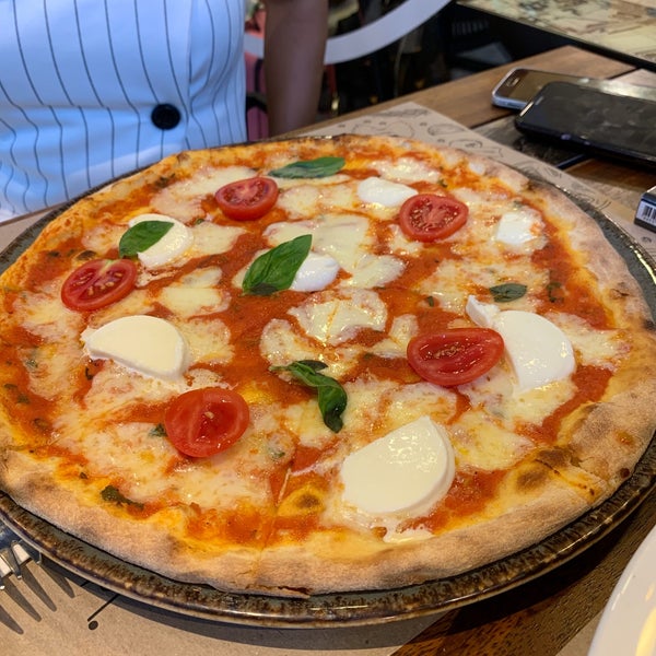 Photo taken at Emporio Pizza &amp; Pasta by Özlem K. on 8/22/2019