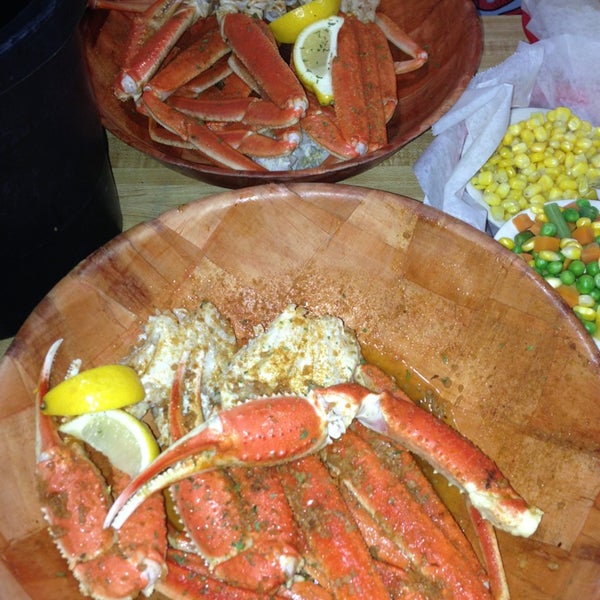 Photo taken at Blue Claw Seafood &amp; Crab Eatery by Jenna M. on 3/12/2013