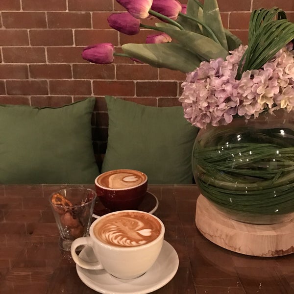 The first place brings coffee and flowers , and it's cozy, Beautiful. You will love this place.