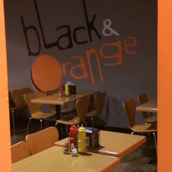 Photo taken at Black &amp; Orange by Fresco R. on 8/16/2014