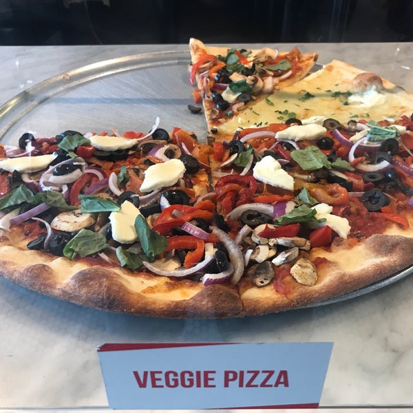 Photo taken at Joe&#39;s Pizza - Hollywood Blvd by Kevin V. on 5/9/2018