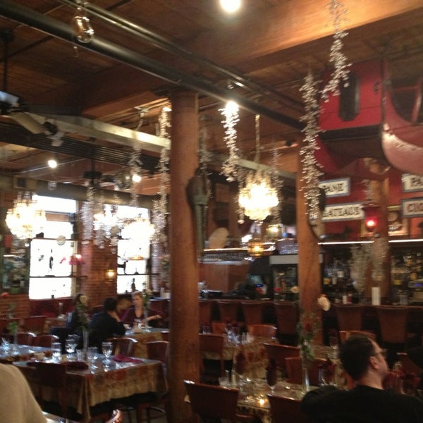 Photo taken at CAV Restaurant by Kevin V. on 1/1/2013