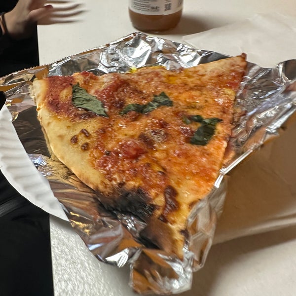 Worth the schlep to Midwood! Thin and cracker-esque, but still has that NYC chew in the crust. Great sauce, cheesy! One of the best in the 5 boroughs.