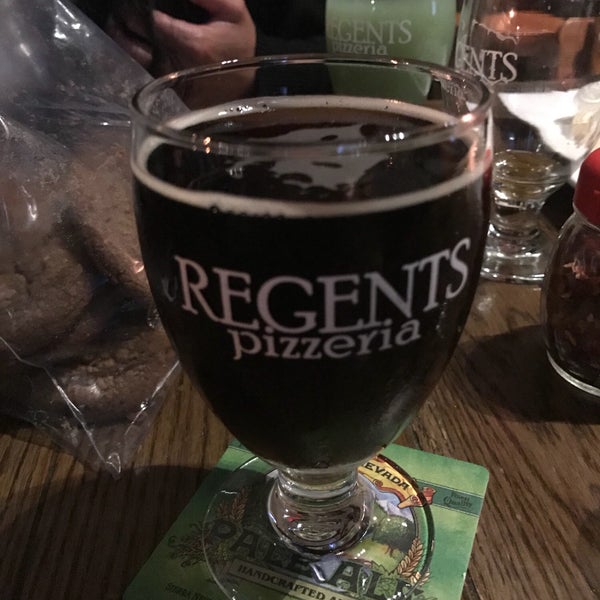 Photo taken at Regents Pizzeria by Oh F. on 7/2/2018
