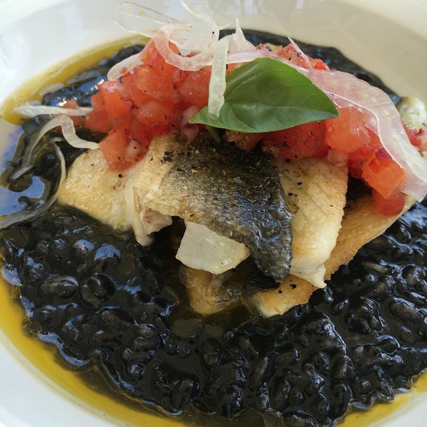Ask for the daily specials! Fish of the day, squid ink risotto and a chilli and tomato salsa! Amazing!