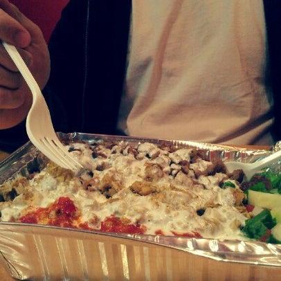 Photo taken at The Halal Bros by Jin C. on 12/18/2012