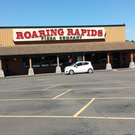 Photo taken at Roaring Rapids Pizza Co. by Thomas P. on 8/28/2014